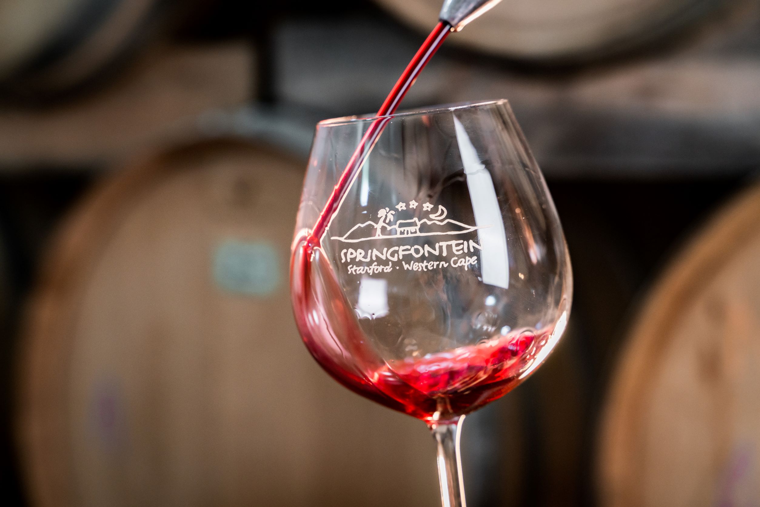 red wine being poured