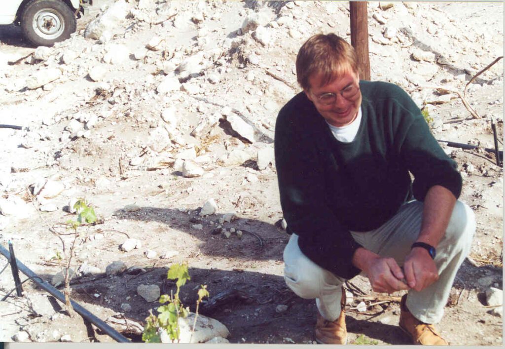 johst in the vineyard, inspecting limestone